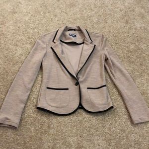 Tan blazer with black trim. NWOT